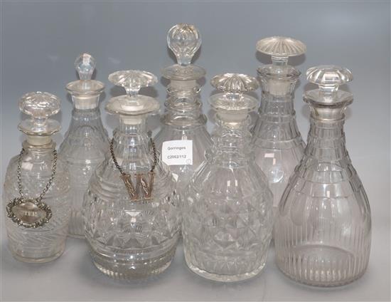 A group of Georgian glass decanters and three Regency japanned coasters